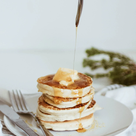 Pancakes with syrup and butter