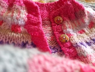 Fair isle yoke cardigan knitted by Carolyn