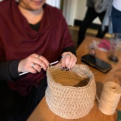 Anna crocheting a plant holder - Knit & Natter Club - October 2022 - Green Man in Toppesfield